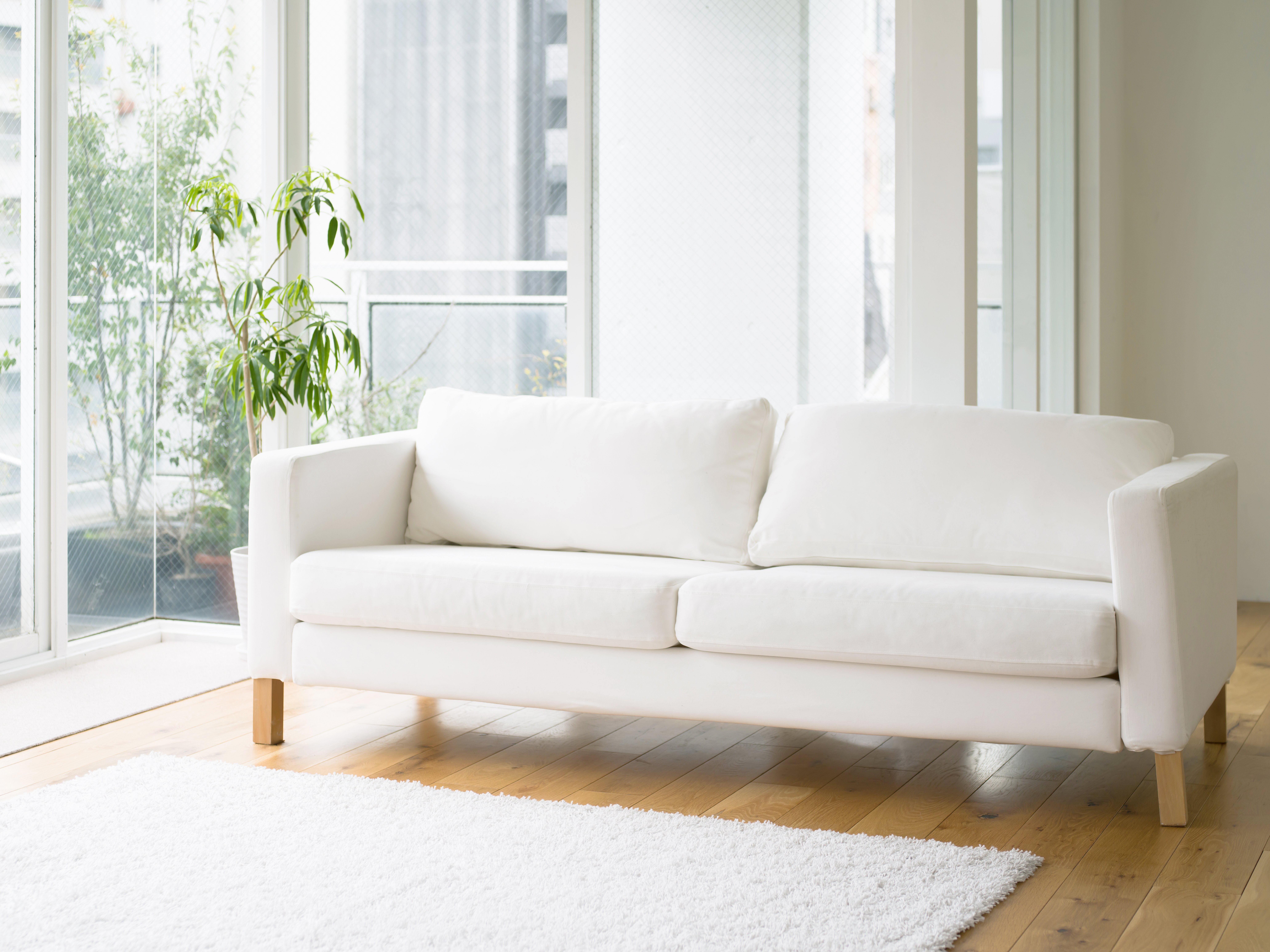 White sofa Lonsdale Flooring in North Vancouver